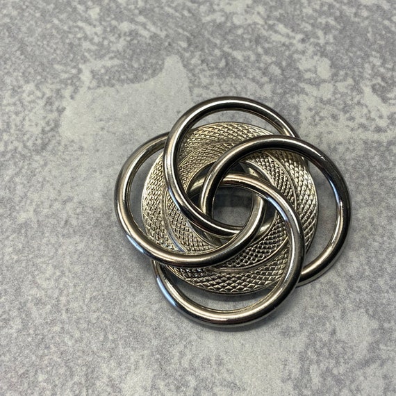 Swirling interlocking loop joint brooch in silver… - image 2