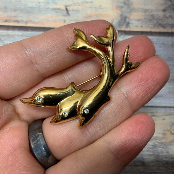 Vintage gold tone rhinestone dolphins brooch - image 4