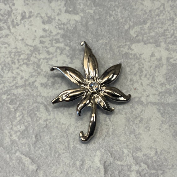 Silver tone rhinestone tropical leaf brooch - image 1