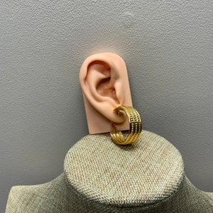 Chunky light weight bead edge pierced lever back hoop earrings in gold tone