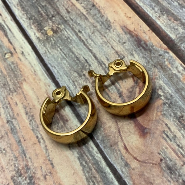 Wide small classic vintage monet clip on hoop earrings in gold tone metal