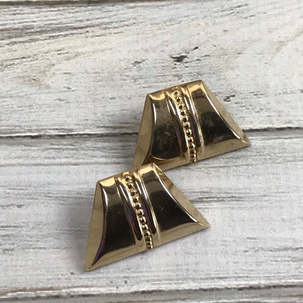 Art Deco style gold tone clip on earrings with geometric design cleopatra style pyramid design