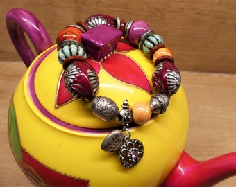 Bracelet with large vintage beads, painted brass, silver brass, ceramic, rhinestones, acrylic