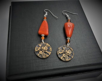 Glass paste earrings, transparent orange glass, hammered copper, silver spinning tops