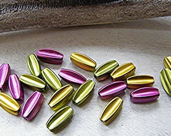 Blend of 10 metallized synthetic beads 13x5 mm
