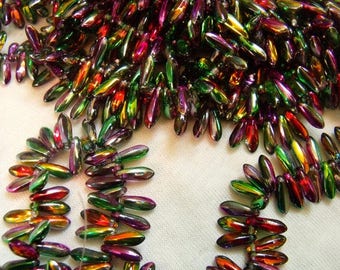 Glass beads shaped drop multicolored and golden 3x11 mm sold by 5