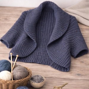 Coprispalle Aran. Modello PDF per lavorare a maglia.