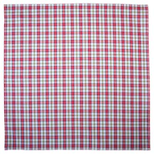 May include: A red, white and blue plaid fabric with a subtle green hue. The fabric has a woven texture and a slightly rough feel.