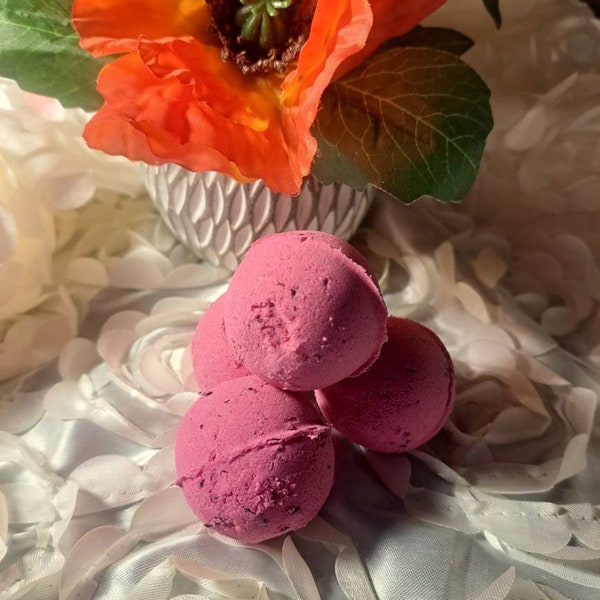 Rose Petal Bath Bomb.  A very luxurious blend of butters and oils to leave your skin soft and smooth with real rose petals