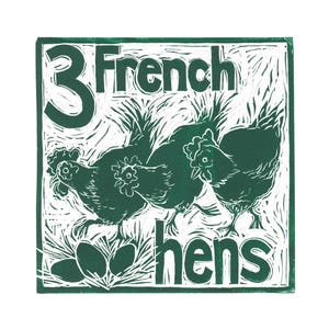 May include: A green linocut print of three chickens with the text "3 French hens" in a white square frame.