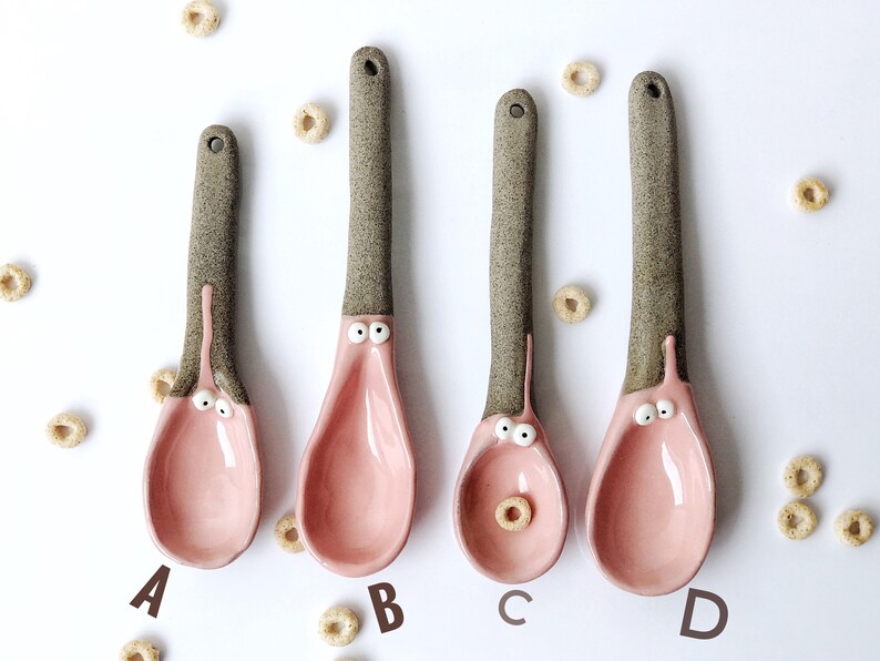 funny dressing spoon. Whimsical ceramic creature spoon