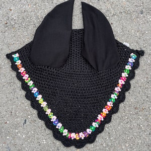 May include: Black crochet horse fly bonnet with colorful flower accents and ear covers.