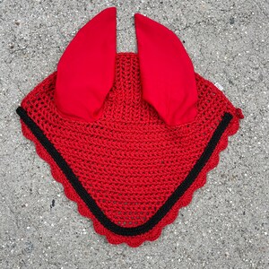 May include: Red horse fly bonnet with black trim and ear covers.