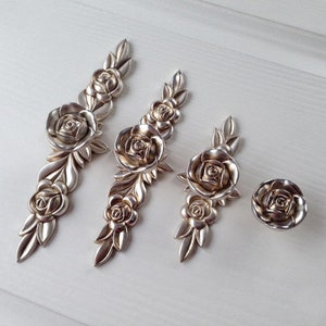 May include: A handmade, wooden cutting board with a natural finish. The board features a juice groove and a handle for easy carrying. Dimensions are approximately 18 inches long, 12 inches wide, and 1 inch thick.