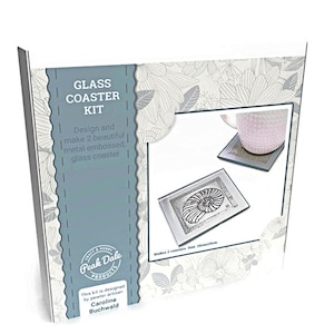 A white and blue square box on a white background.  The box says Glass Coaster Kit and on the right shows a picture of a cup on a coaster and the other coaster shows an embossed image of a shell