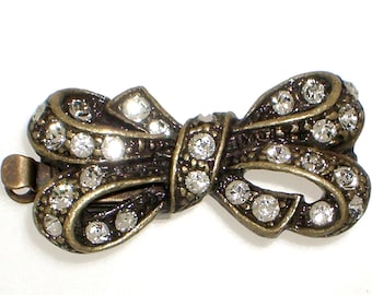 Claspgarten One-Strand Bow-Shaped Box Clasp in Antique Brass or Black Copper Finish with Crystals, 22x11mm