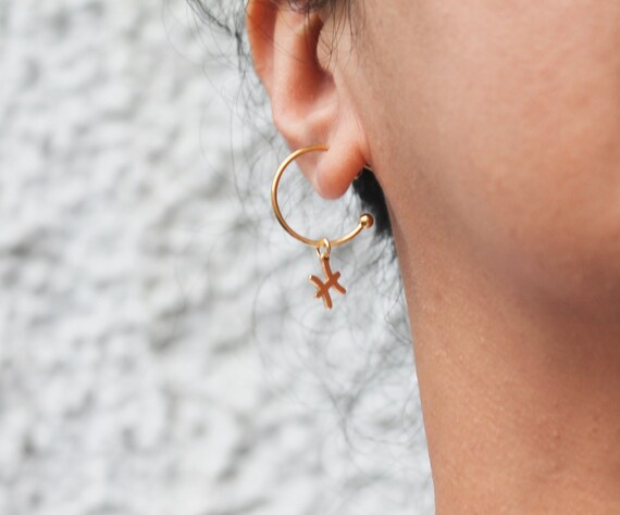 Swarovski shop mismatched earrings