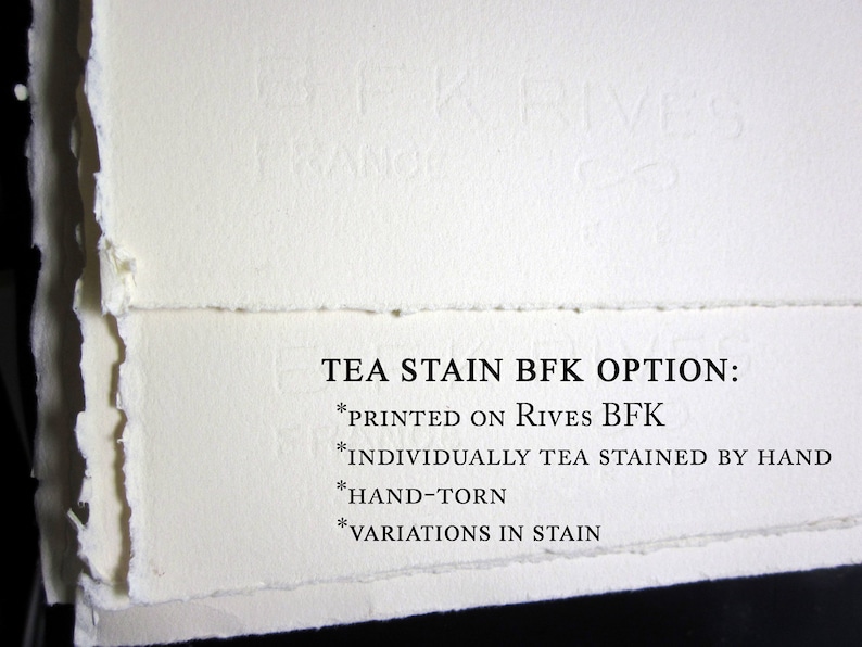 May include: Off-white paper sheets with hand-torn deckled edges and a subtle embossed BFK Rives France watermark. The text reads: TEA STAIN BFK OPTION: *PRINTED ON RIVES BFK *INDIVIDUALLY TEA STAINED BY HAND *HAND-TORN *VARIATIONS IN STAIN.