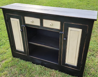 Rustic farmhouse media console | Primitive TV stand with distressed black finish and off-white panels