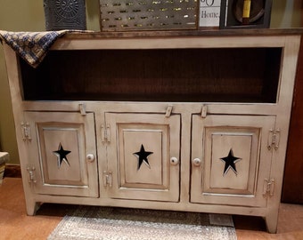 Primitive online tv stand