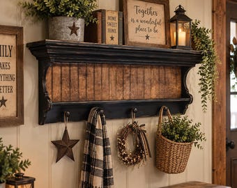 Rustic farmhouse entryway shelf with pegs, distressed wood coat rack