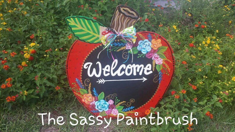 Sassy Apple Door hanger with beautiful flowers