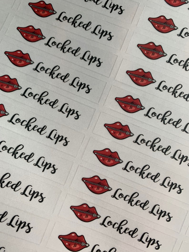 May include: A sheet of white stickers with red lips with a zipper on them. The text "Locked Lips" is written on each sticker.