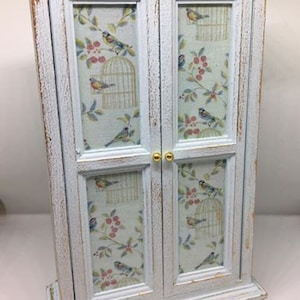 Handmade miniature dolls house furniture. Shabby chic style mint green wardrobe with bird decals