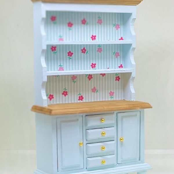 1:12th scale miniature dolls house furniture. Welsh dresser hand painted in pale green with oak effect and floral detail.