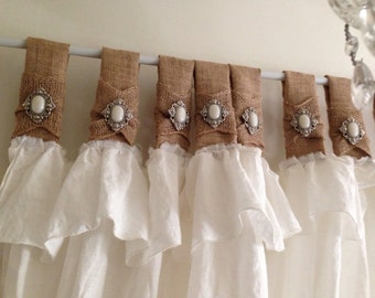 Burlap and white linen curtains with jewelry accent
