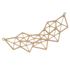 May include: Gold geometric pendant with a delicate, intricate design. The pendant is made of metal and has a slightly curved shape.