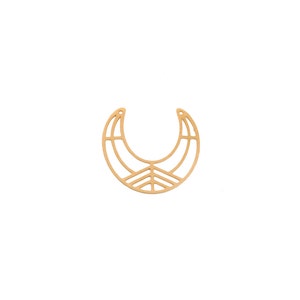 May include: A gold-colored, crescent-shaped pendant with a geometric design. The pendant features a series of curved and straight lines, creating a stylized, openwork pattern. The design includes a small, triangular element at the base of the crescent.