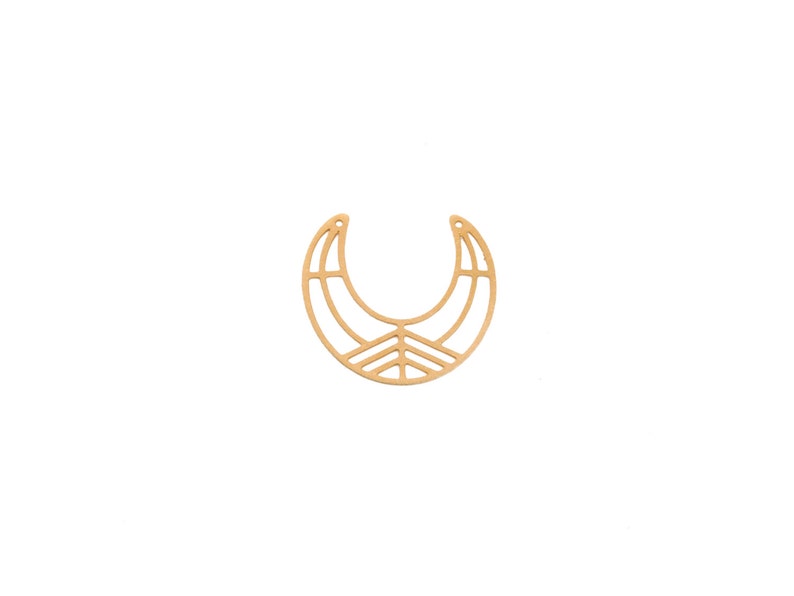 May include: A gold-colored, crescent-shaped pendant with a geometric design. The pendant features a series of curved and straight lines, creating a stylized, openwork pattern. The design includes a small, triangular element at the base of the crescent.