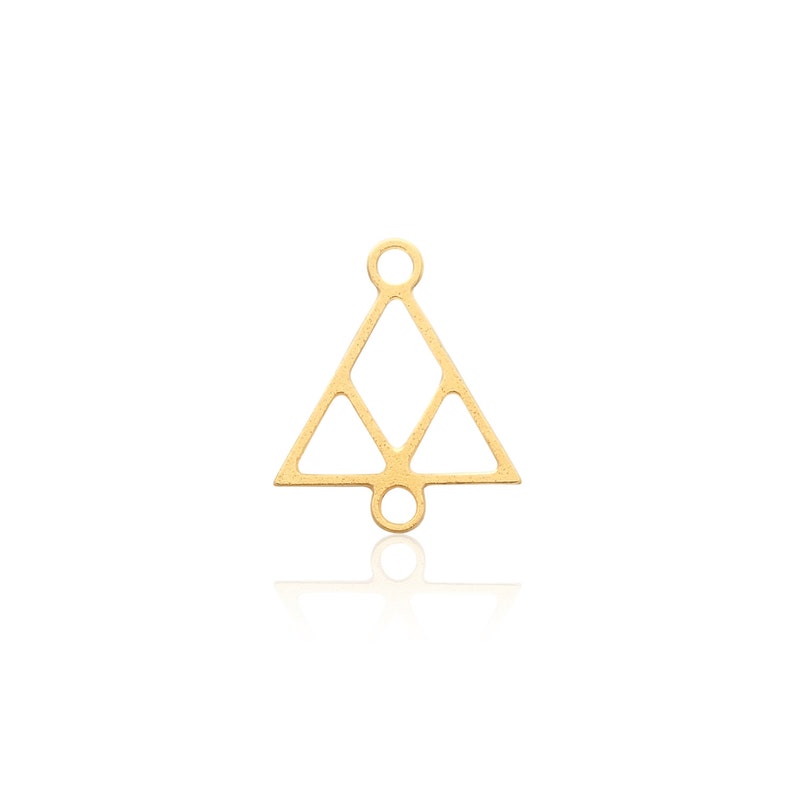 May include: Gold-toned metal triangle charm with a geometric design. The charm has two jump rings for attaching to jewelry.