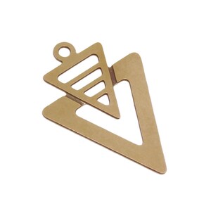 May include: Gold-toned metal pendant with a geometric design featuring two overlapping triangles. The larger triangle has a cutout in the shape of a smaller triangle.