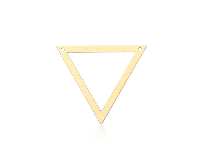 May include: A gold triangle pendant with a hollow center. The pendant has two small holes at the top for attaching a chain.