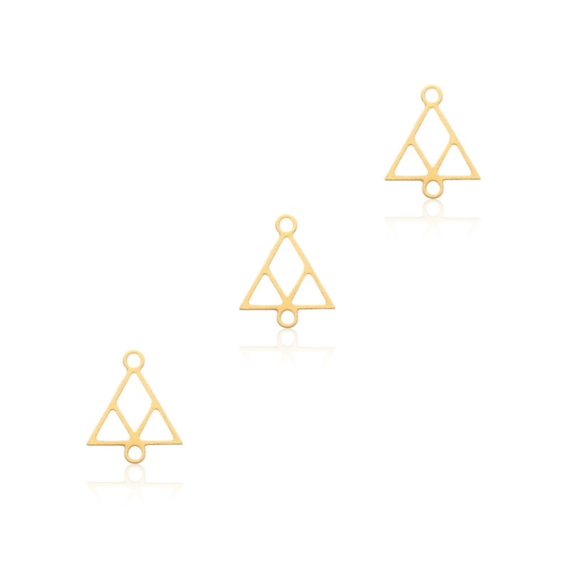 May include: Three gold-toned triangle-shaped metal charms with openwork designs and jump rings.
