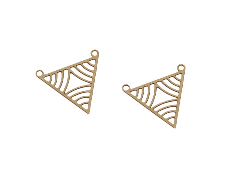 May include: Two gold-toned metal triangle pendant charms with a geometric pattern. The charms have two loops at the top for attaching to jewelry.