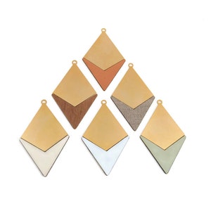 May include: Six gold diamond-shaped pendants with different colored inserts. The inserts are in shades of brown, orange, white, gray, and green.