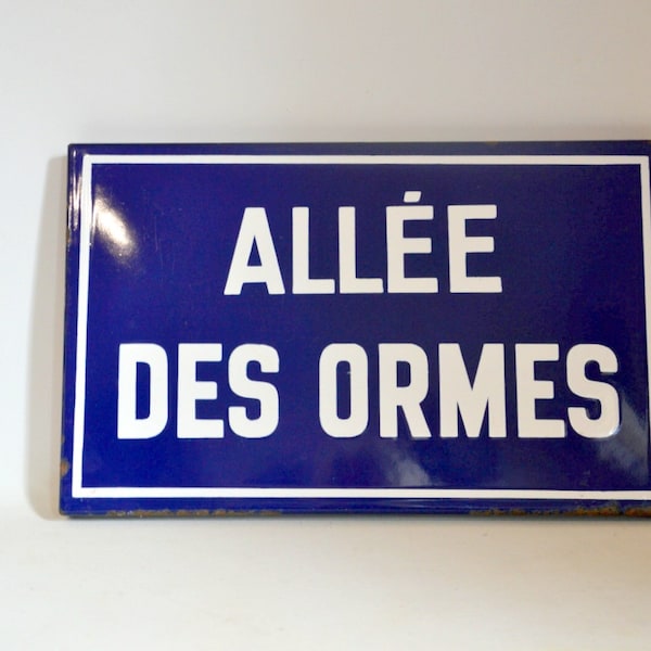 vintage enamel sign at Place des Ormes in France