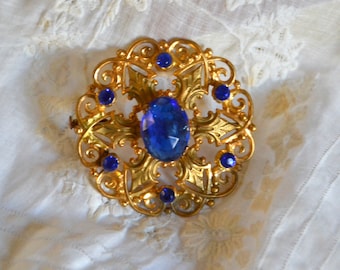 beautiful round brooch sapphire glass and gold metal vintage 1900 Edwardian style