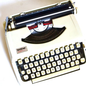 BROTHER model 200 mechanical typewriter straw yellow