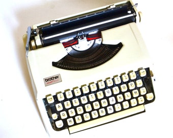 BROTHER model 200 mechanical typewriter straw yellow