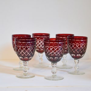 engraved burgundy colored stemmed glass