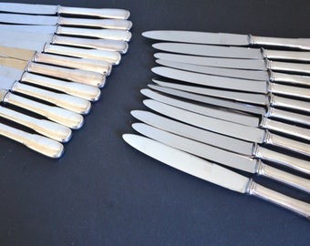 set of 24 silver metal knives
