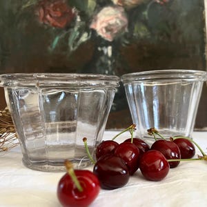 2 old jam jars