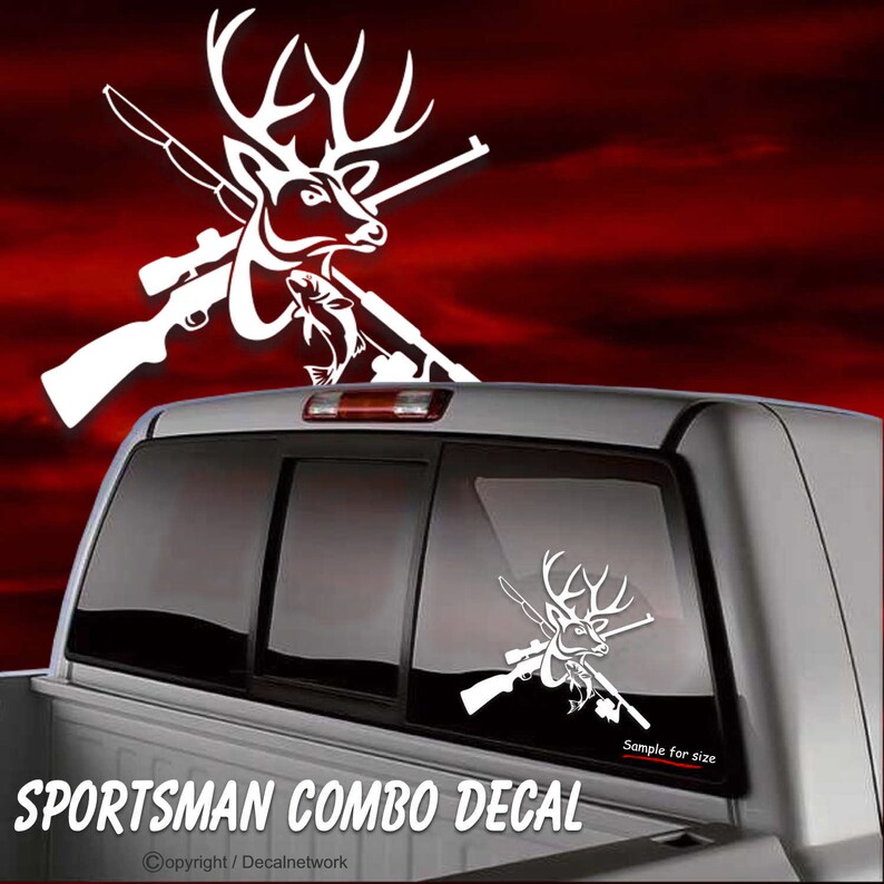 May include: White vinyl decal of a deer with crossed rifles and a fish. The decal is on the back window of a pickup truck. The text "SPORTSMAN COMBO DECAL" is at the bottom of the image.