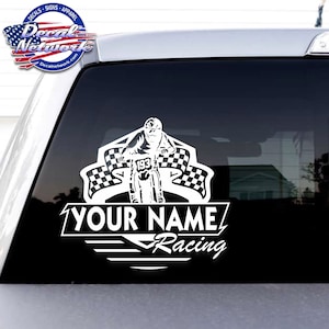 May include: White vinyl decal of a motocross rider with a checkered flag background. The decal includes the text "YOUR NAME Racing".