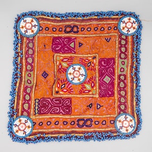 Hand embroidered Kuchi dress front