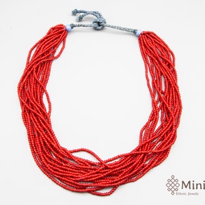 Ethnic red necklace made of tiny red beads with white heart - Vintage  Baule Tamba belt of 16 strings of beads